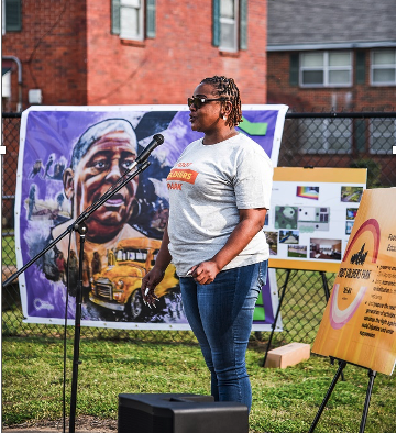 Foot Soldier Park Founding Partner & Executive Director Kimberly Smitherman welcomes guest at first anniversary celebration.