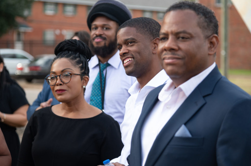 Mayor Melvin Carter surrounded by guests at civil rights tour
